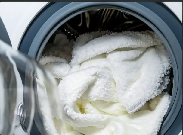 wash a down comforter in the washing machine